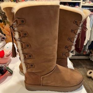 Authentic women’s UGG size 9 with tassel lace up detail